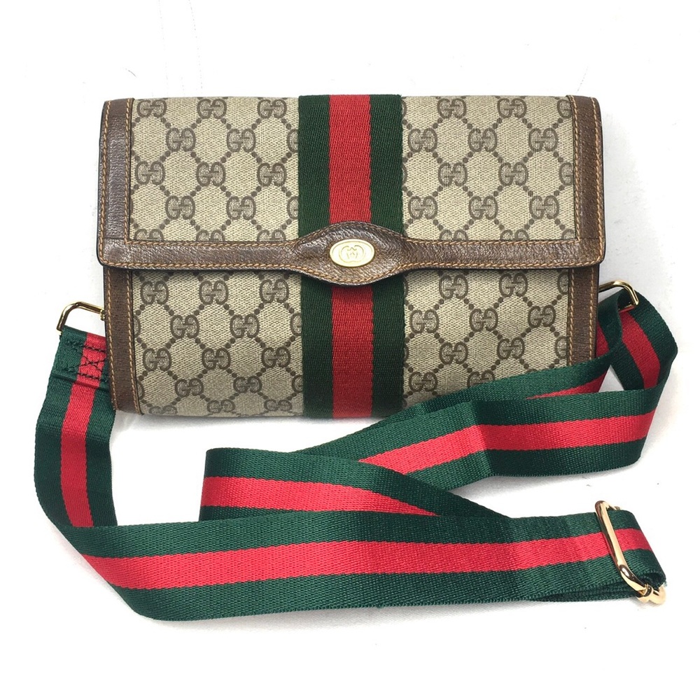 Authentic Gucci brown monogram coated canvas crossbody bag